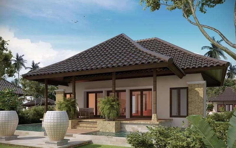 Prefab house level 4 with tiled roof features a traditional style