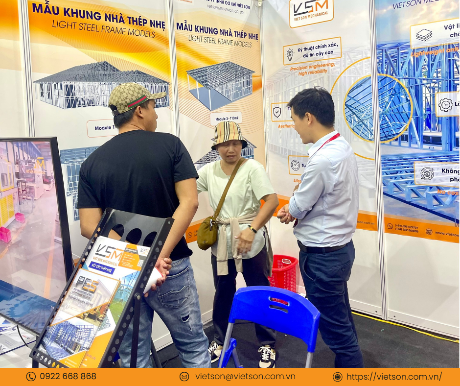 Customers visit the booth