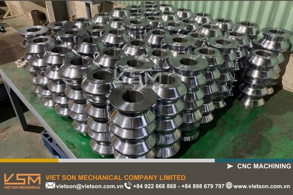 Gia công trục bánh cán máy
